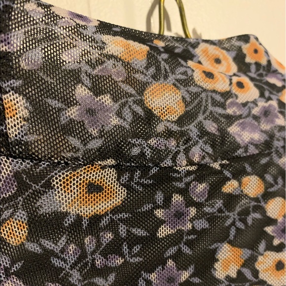 Long sleeve, mesh turtle neck with purple and yellow flowers. - Picture 2 of 4